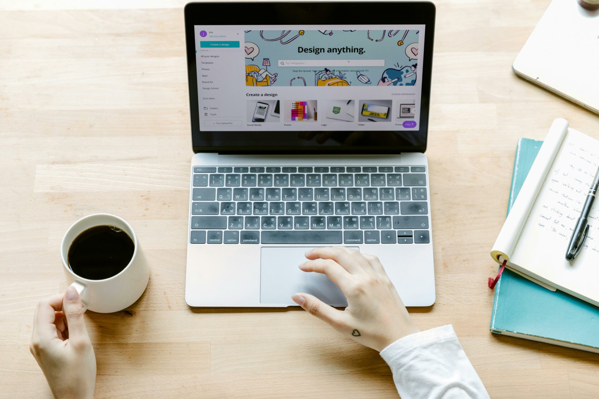 Laptop displaying graphic design software